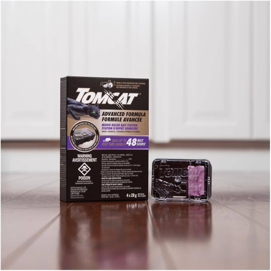 Tomcat Advanced Formula box beside an assembled disposable mouse bait station